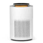 air purifier malta: Round white air purifier with night light, perforated lower body and orange light ring under the top cont