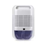 Back of the dehumidifier showing top carry handle, rear air intake grille and transparent water tank at the bottom