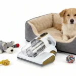 dust mite vacuum malta: Handheld mattress dust mite vacuum on the floor beside a dog in a pet bed, with twin clear dust cups